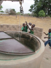 Boys at Sare Bakary's open well
