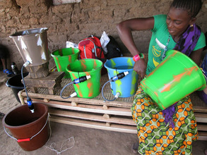 Mariama assembling her Sawyer Filter in Borehole