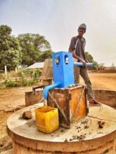 Installing the new Bluepump at Dankunku Hospital