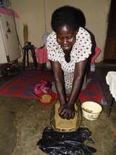 MamoYete Grinding Groundnuts for us