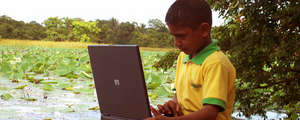 A student using a laptop