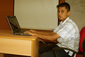 Tharanga Sampath with the laptop