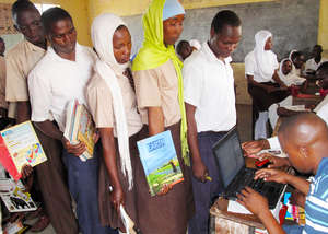 Students waiting to check out books