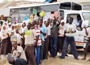 Students posing with their selected books