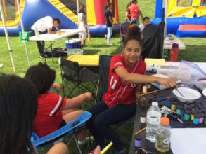 Face painting for Harrisonburg Hispanic Festival