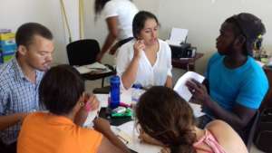Teachers & Assistants Collaborating on Curriculum