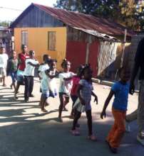 Children enter their new pre-K classroom.