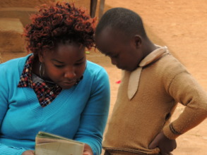 Teacher Supporting Student's Reading