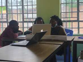Staff upskilling their digital literacy competency