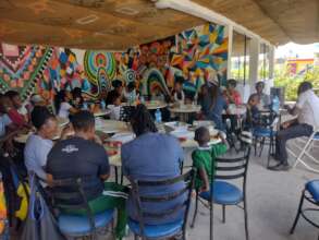 Staff Share a meal together