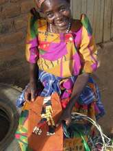 Woman from Katovu showing pride in her fabric coll
