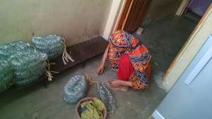 Yasmin making bangles