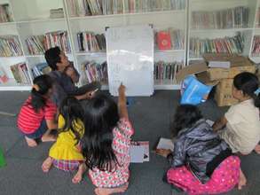 Andi also teaches children in YUM library