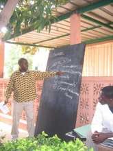 Malick Kone Teaching the Peer Educators