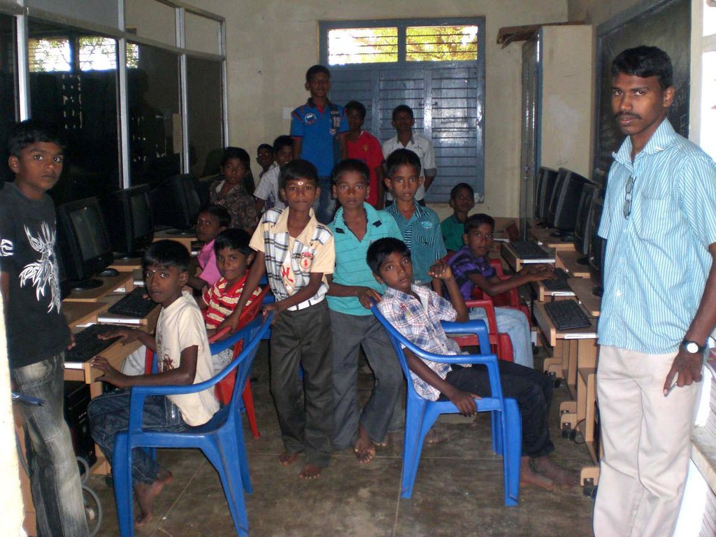 Teach computer basics to rural children in summer