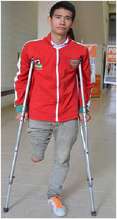 Carlos with his crutches