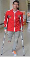Carlos with his crutches