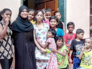 Saleha with Girl Participants and their Siblings
