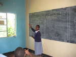 a deaf girl using sign language to give a point