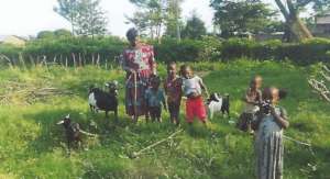 Betsy with Her Grandchildren and Their Animals