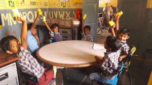 Children enjoying their Saturday snacks