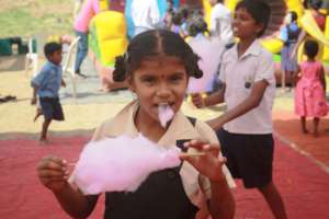 Eating Cotton candy at the christmas celebration