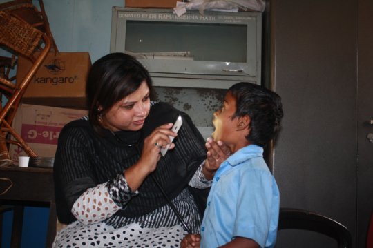 Doctor seeing a child