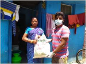 Giving Rations to a mother