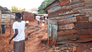 Jinja  artisan, Adiyo, in her neighborhood