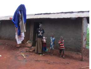 Alum at her home where she lives with six children