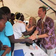 Jinja women saying farwell to English trainers