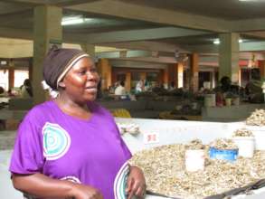 Nabatanzi at her business in May  - saving money