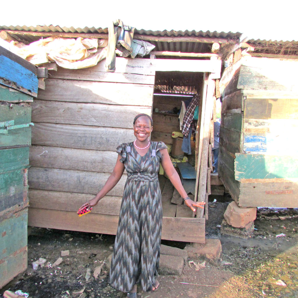 Santa Outside Her Shop in Jinja Uganda