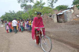 Adolescent Girl on bicycle