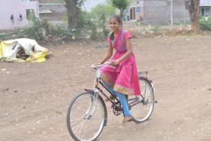 Adolescent Girl on bicycle