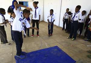 Children play-acting the water safety messages