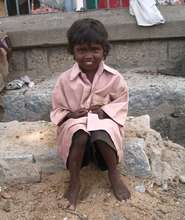 Street child living near fish market in Vellore