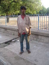 Kutti, an orphan, a rag picker