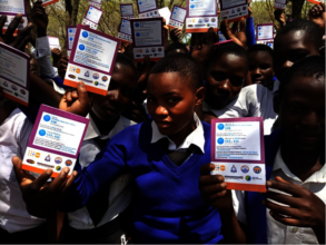 Girls Holding Health Passports