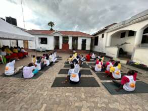 Girls at safe house doing yoga