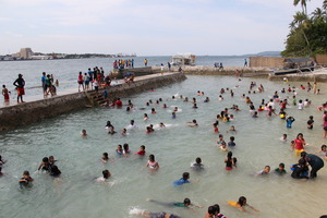 Kids pampering themselves in beach during fun day