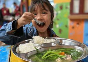 Children having lunch at the main center
