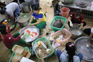 Cleaning up the kitchen afte the flooding