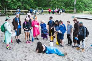 Consulting a mermaid during an evening activity