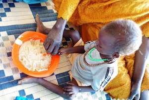 A child receives food.