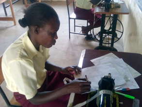 one one of our girls in clothing technology class