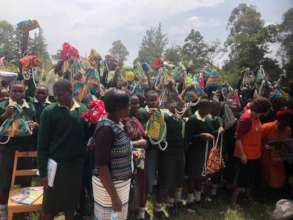 Girls receiving their washable towels