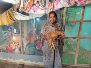 Selina with her chickens