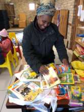 Teacher Caroline with gifts from Jonique