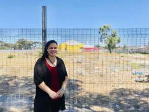 Nada in front of the land for our new school